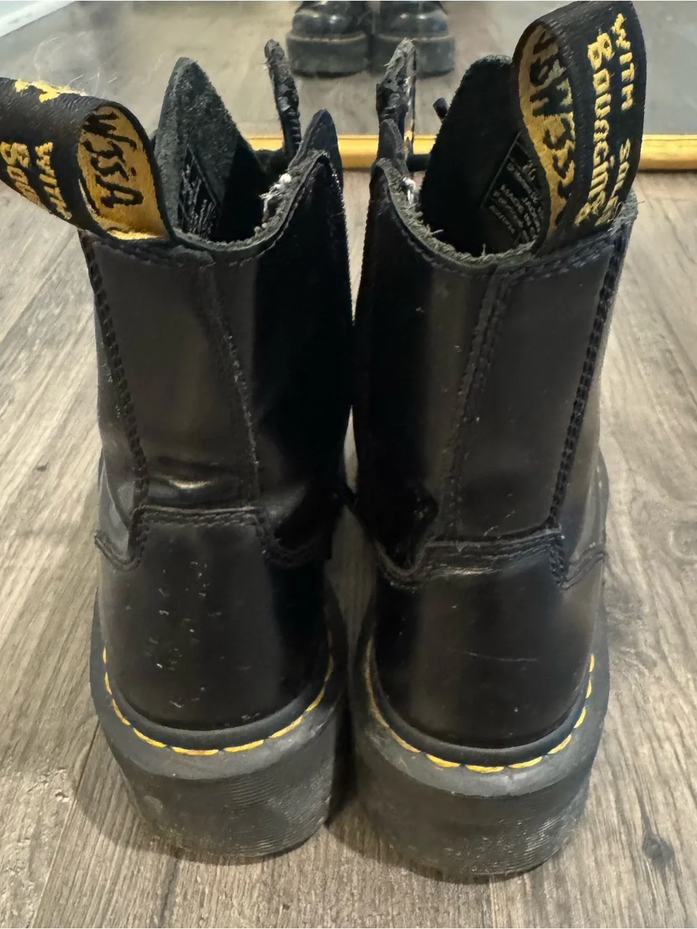 Dr. Martens Black Platform Combat Boots with Yellow Stitching